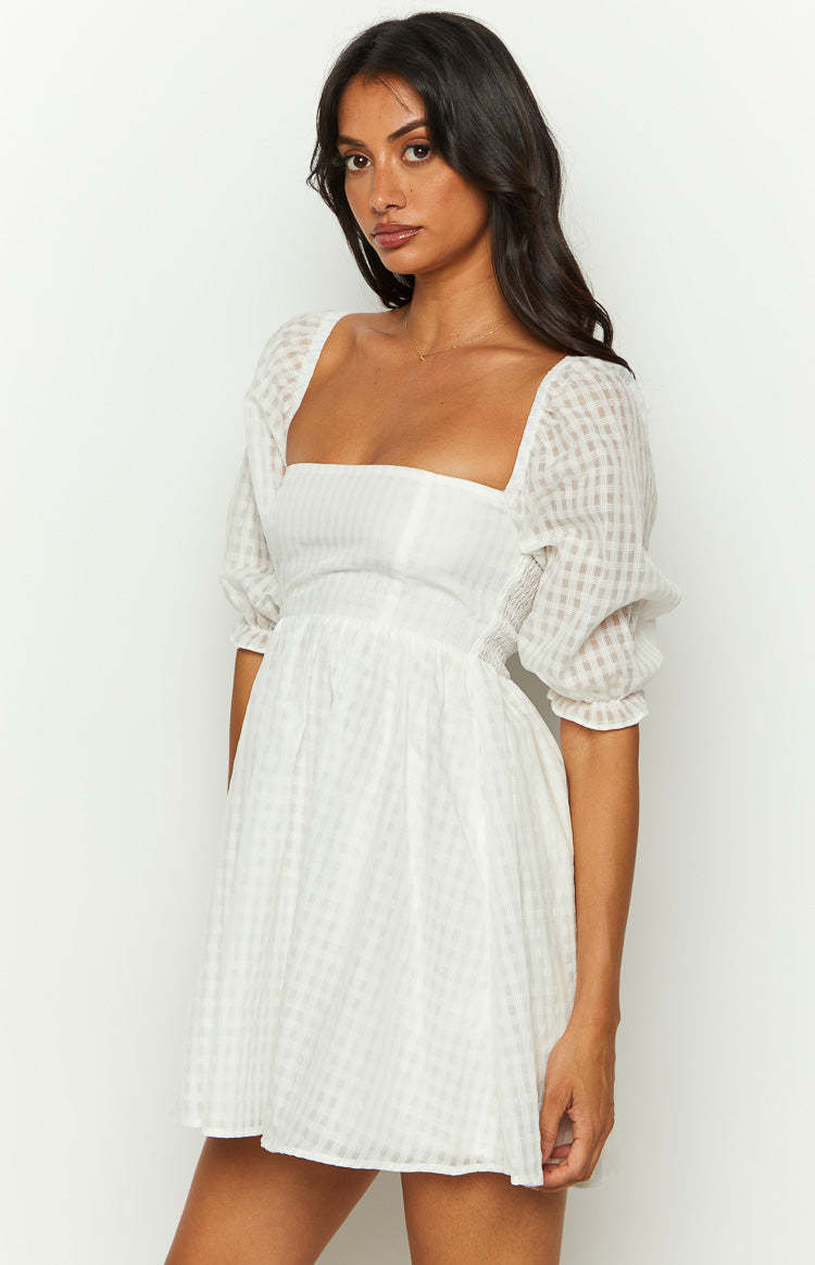 Rubi White Babydoll Mini Dress-Vavasi.All Rights Reserved.