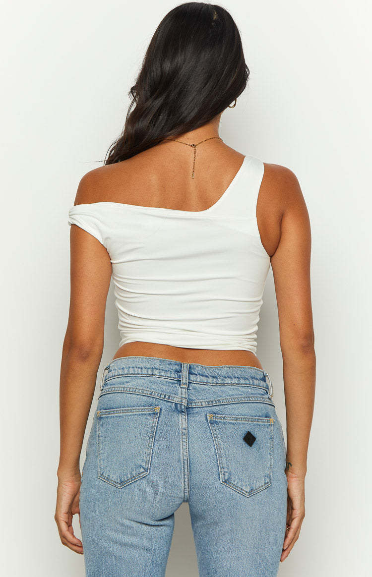 She's Sleek White Off Shoulder Asymmetric Top-Vavasi.All Rights Reserved.