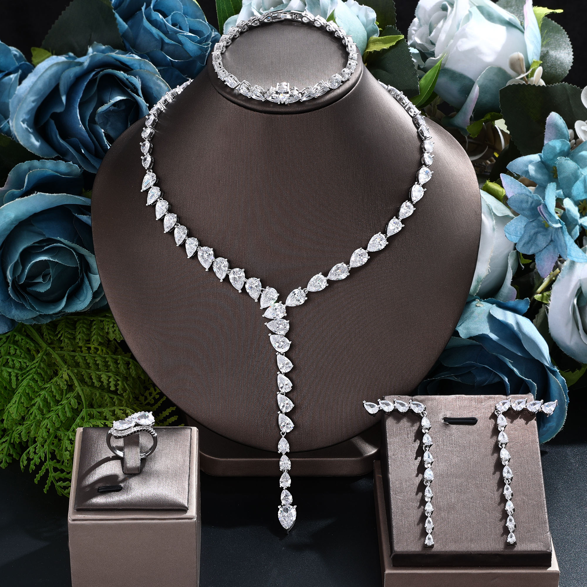 Four-Piece Set Of Shining Zircon Necklace Earrings Ring and Bracelet