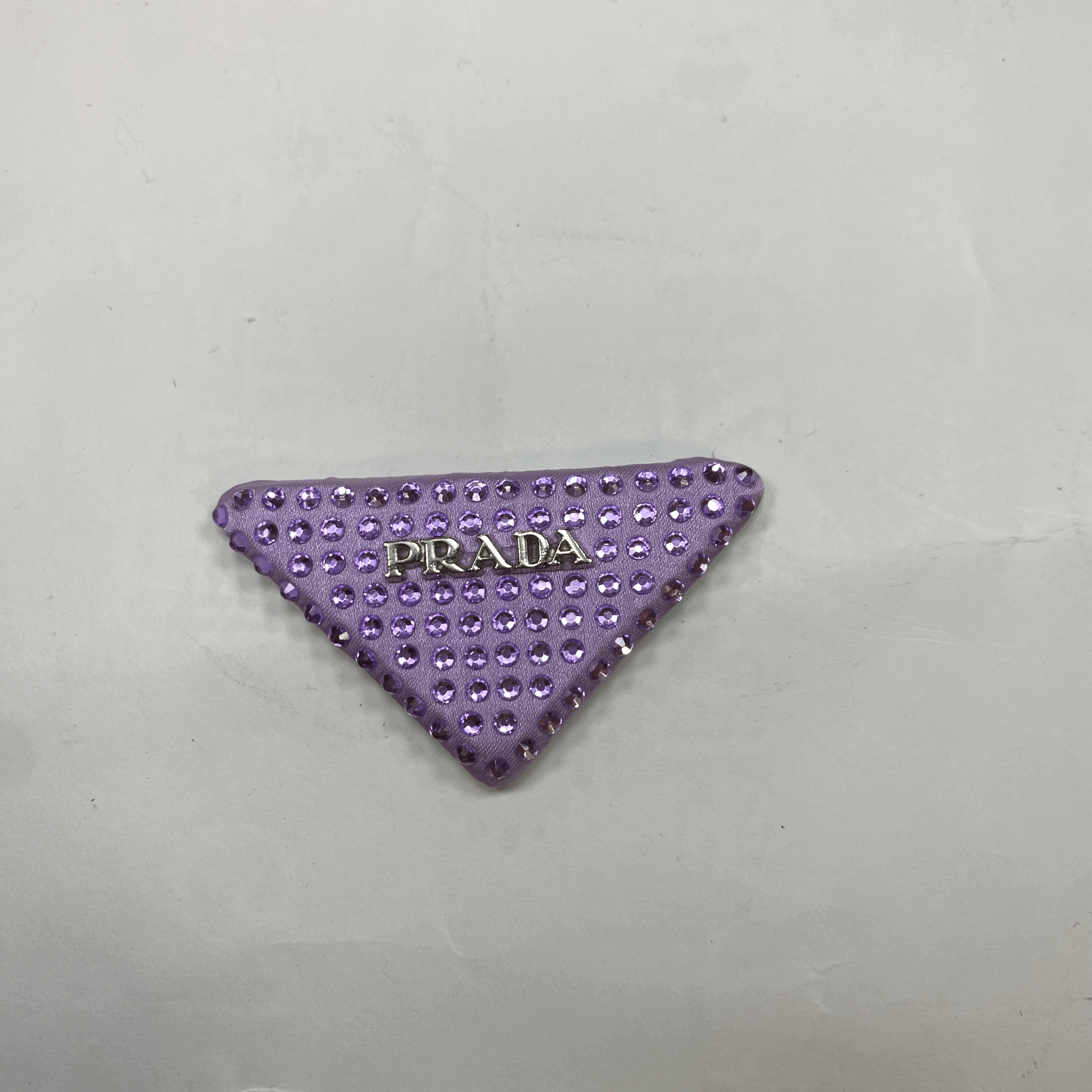 medium and small (roning & sewing) Prada patch 1