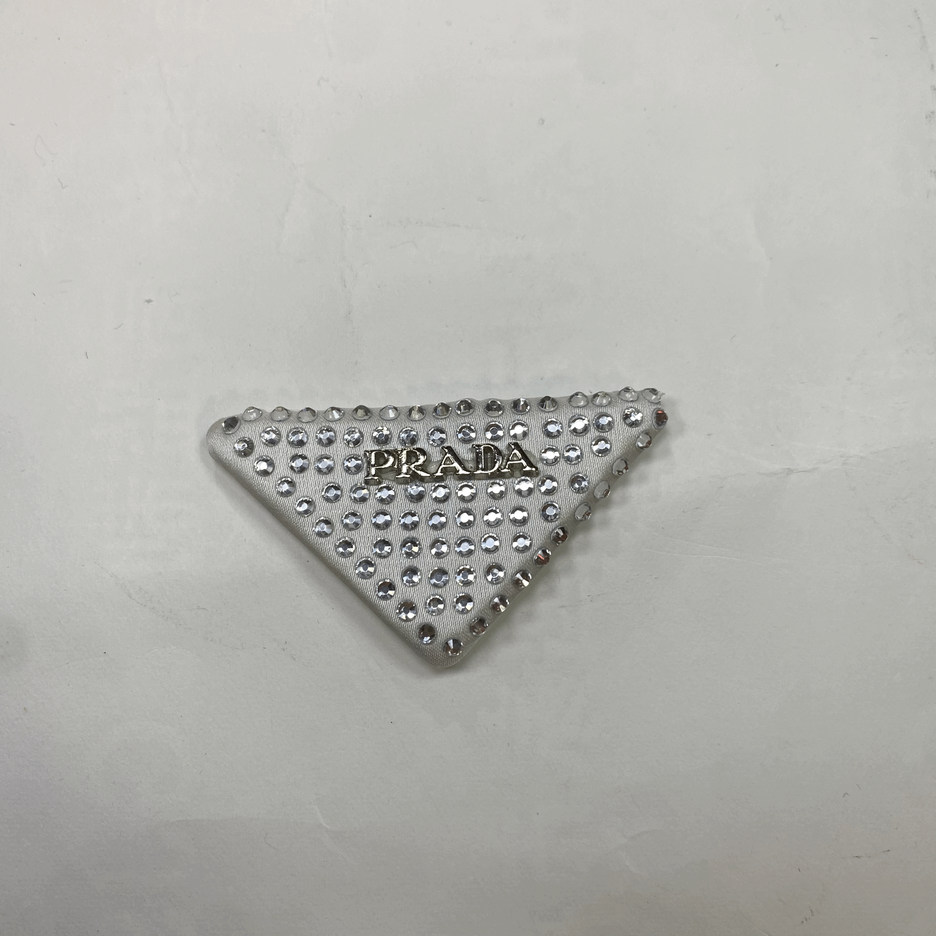 medium and small (roning & sewing) Prada patch 1