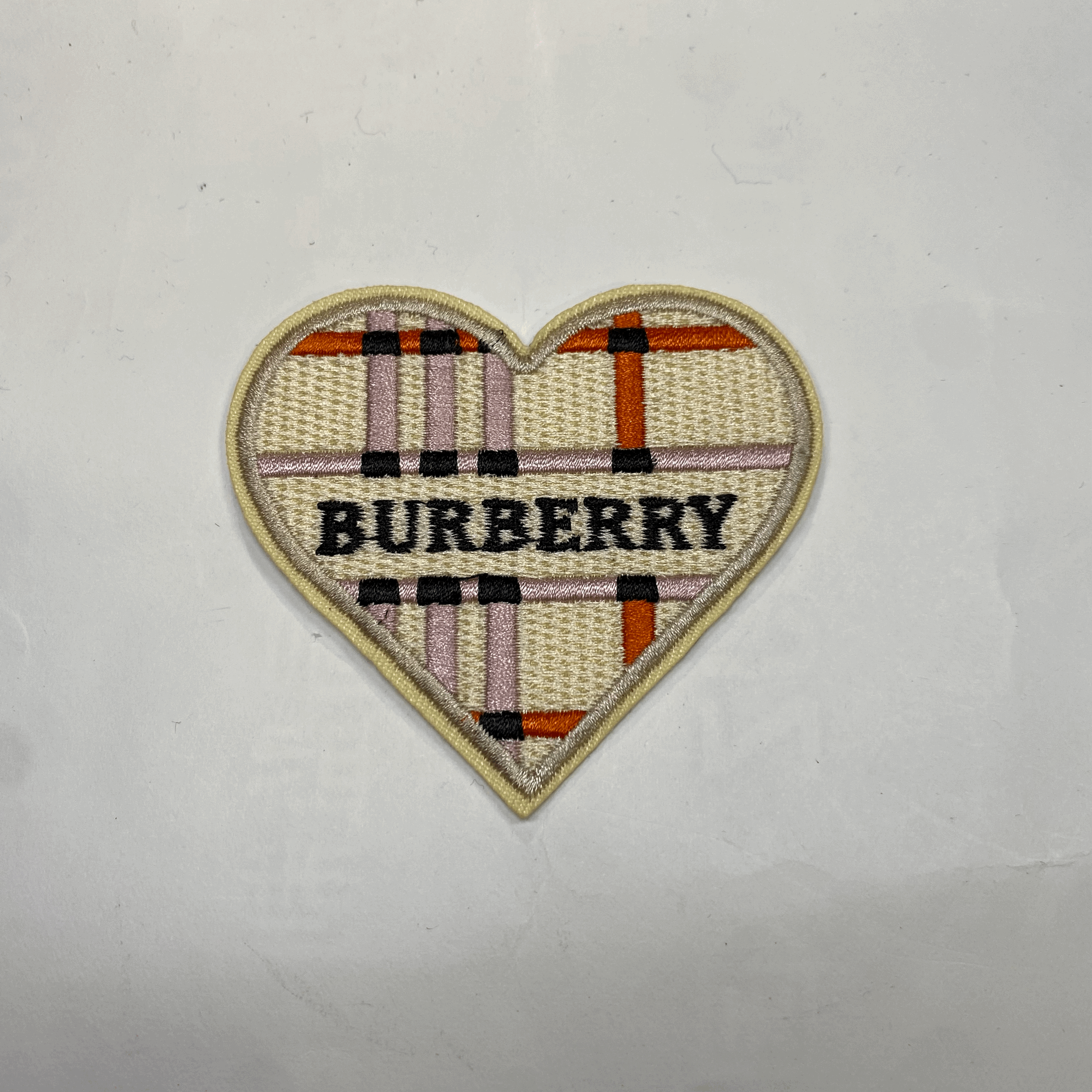 medium and small (roning & sewing) Burberry patch 1