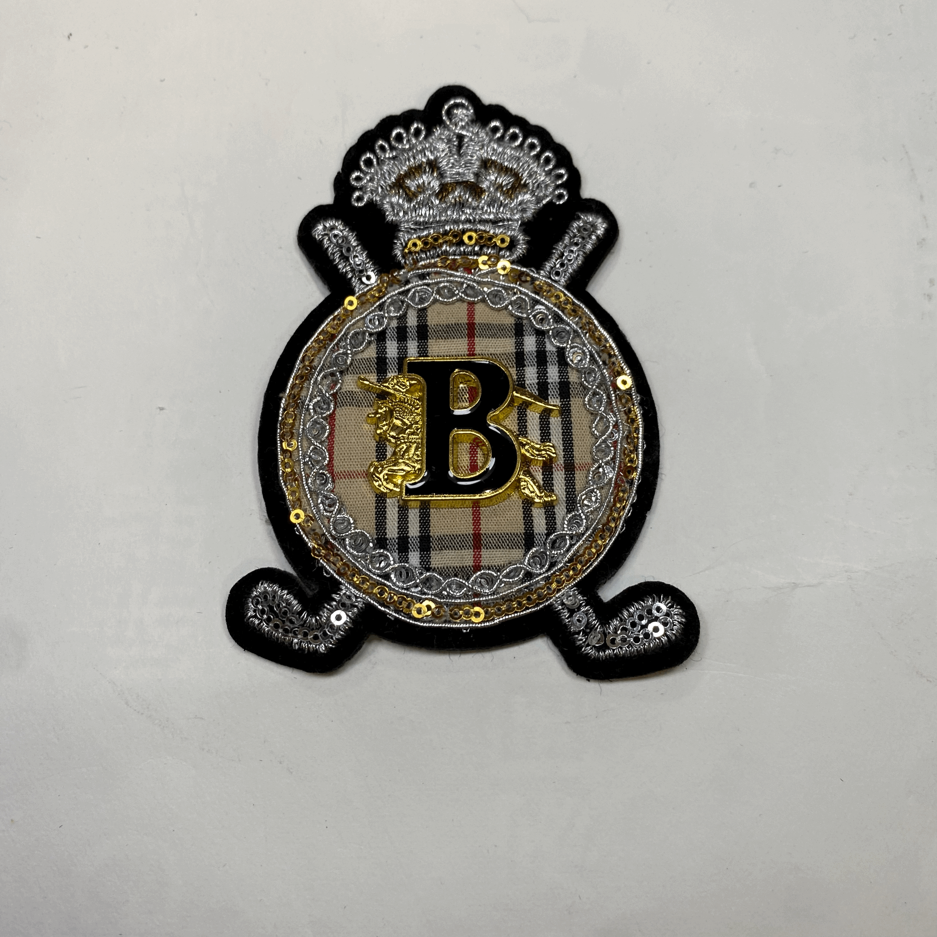 medium and small (roning & sewing) Burberry patch 1
