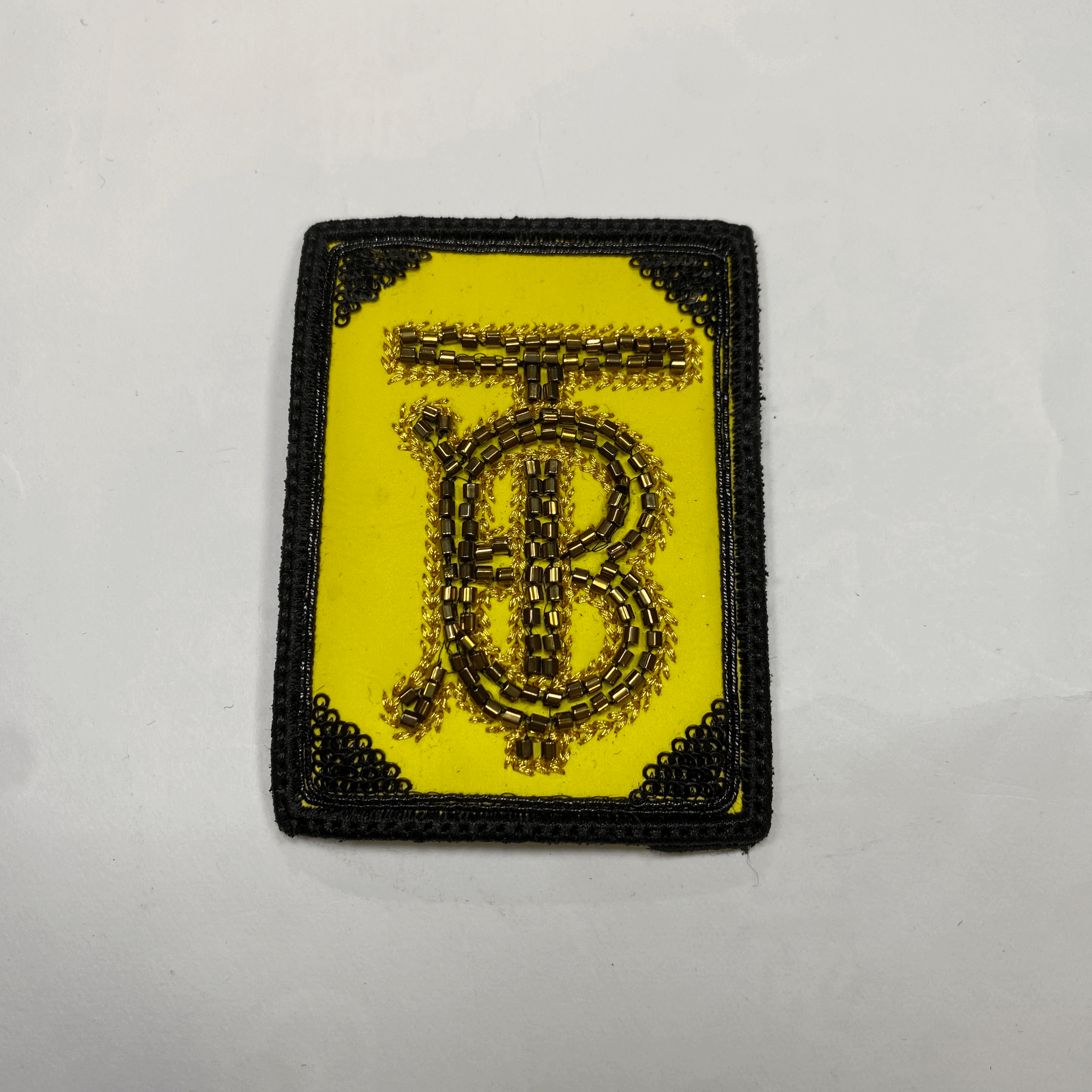 medium and small (roning & sewing) Burberry patch 1