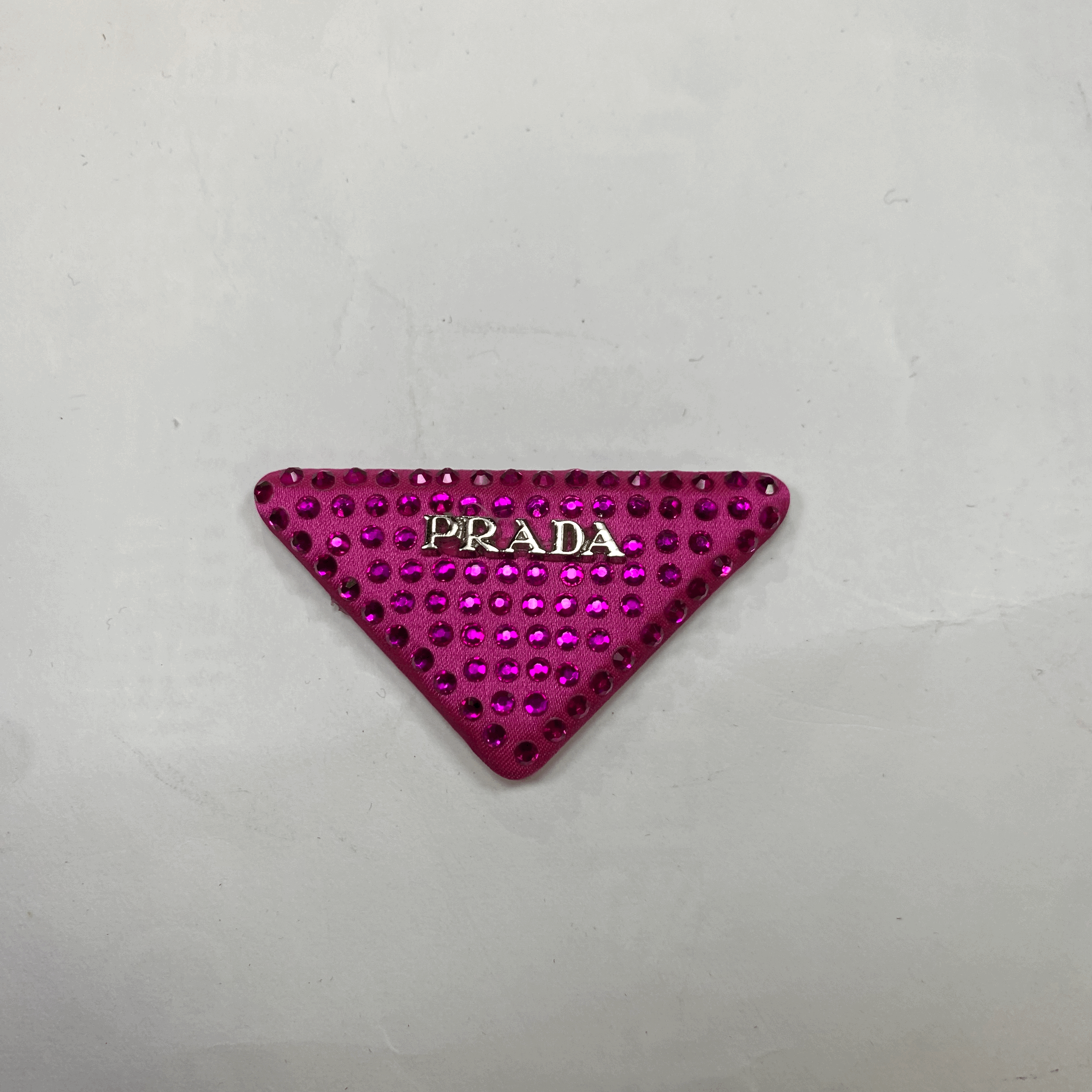 medium and small (roning & sewing) Prada patch 1