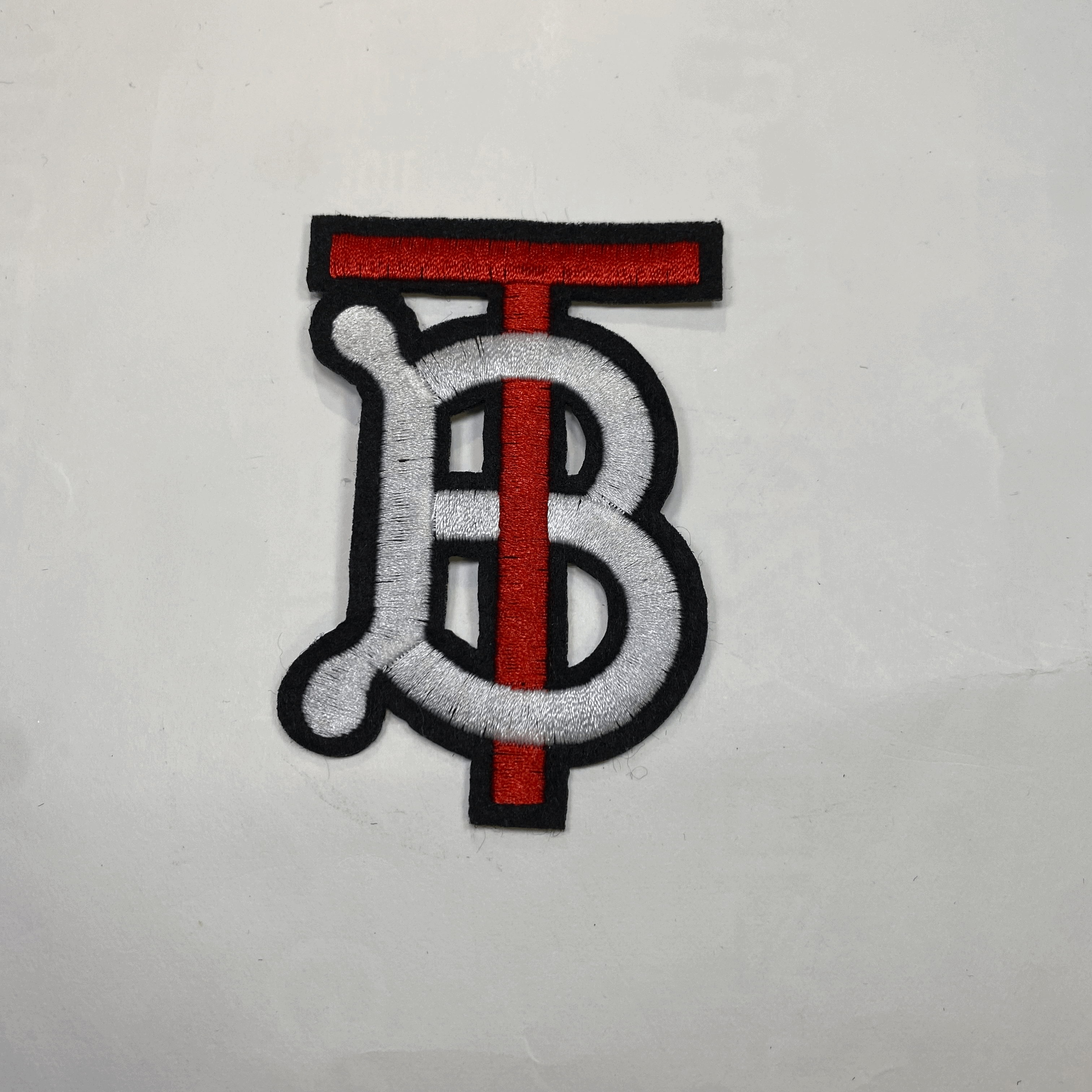 medium and small (roning & sewing) Burberry patch 1