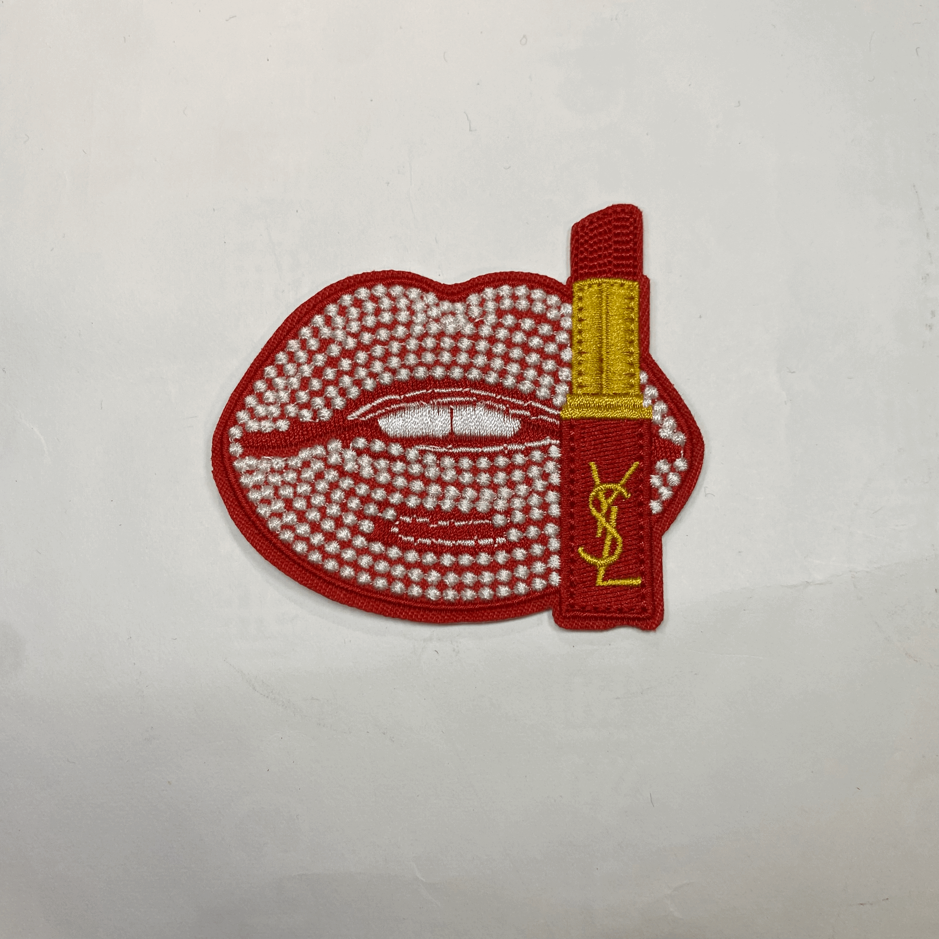 medium and small (roning & sewing) YSL patch 1