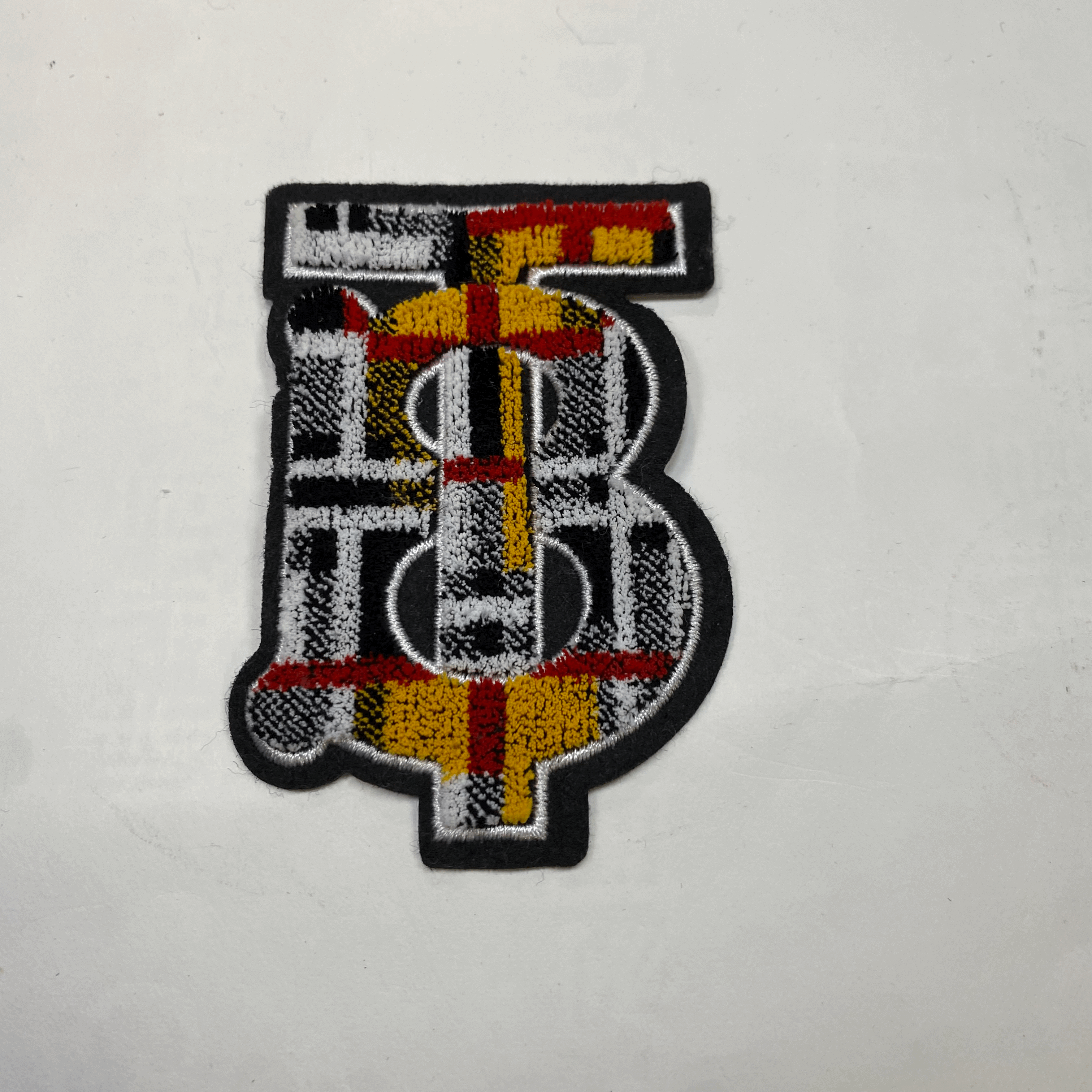 medium and small (roning & sewing) Burberry patch 1