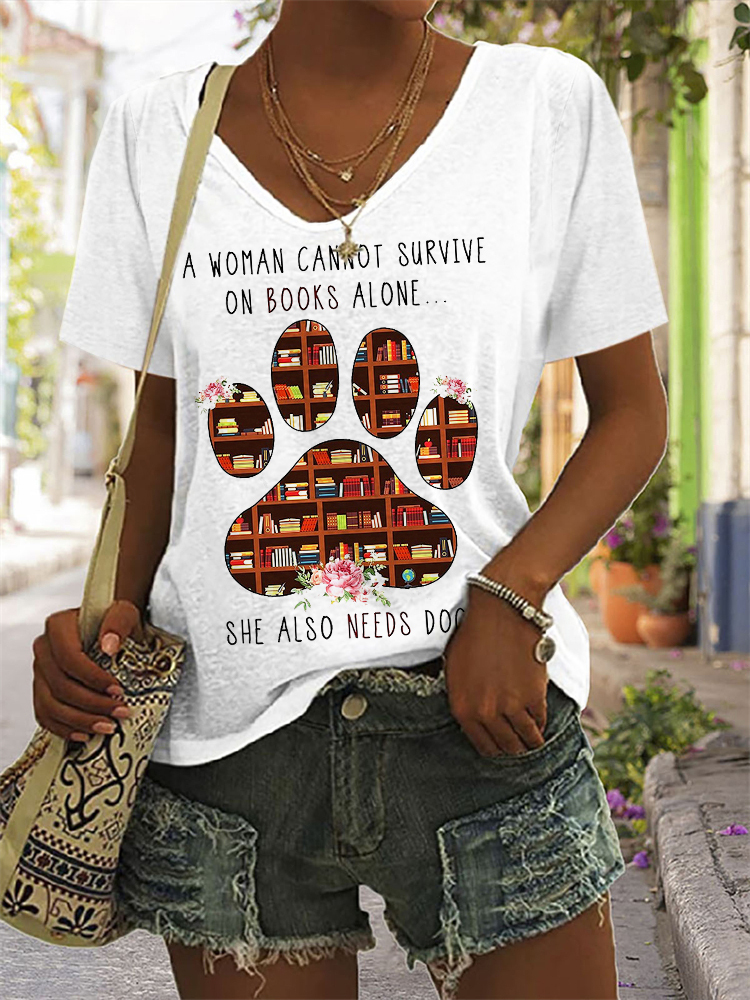 A Woman Cannot Survive On Books Alone - She Also Needs Dogs T-Shirt-Datalatt