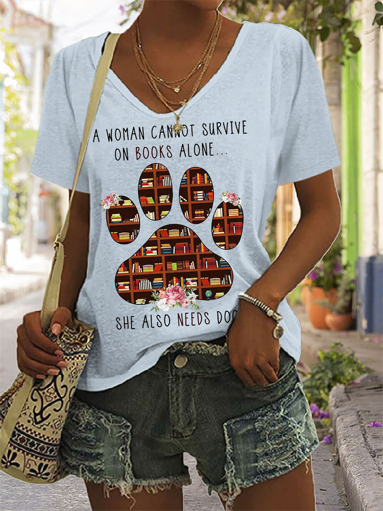 A Woman Cannot Survive On Books Alone - She Also Needs Dogs T-Shirt-Datalatt