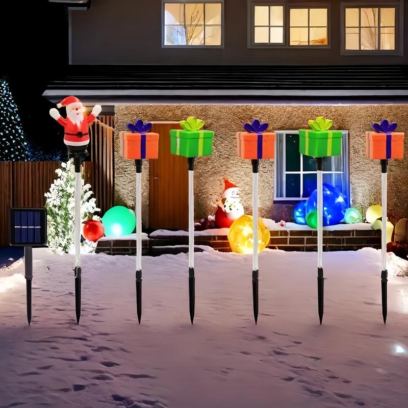 6-Pack Solar Christmas Decorative Lights Christmas-Themed LED Fairy Lights Featuring Santa Claus, Christmas Trees, and Reindeer Plastic Material IP44 Waterproof Rating Ideal for Lawn and Garden Pathway Decorations Holiday Decorations