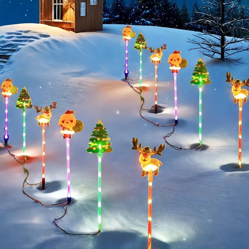 6-Pack Solar Christmas Decorative Lights Christmas-Themed LED Fairy Lights Featuring Santa Claus, Christmas Trees, and Reindeer Plastic Material IP44 Waterproof Rating Ideal for Lawn and Garden Pathway Decorations Holiday Decorations
