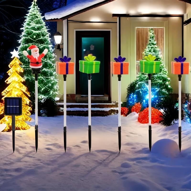 6-Pack Solar Christmas Decorative Lights Christmas-Themed LED Fairy Lights Featuring Santa Claus, Christmas Trees, and Reindeer Plastic Material IP44 Waterproof Rating Ideal for Lawn and Garden Pathway Decorations Holiday Decorations