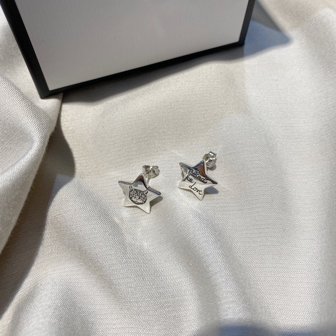 SILVER BLIND FOR LOVE STAR EARRINGS