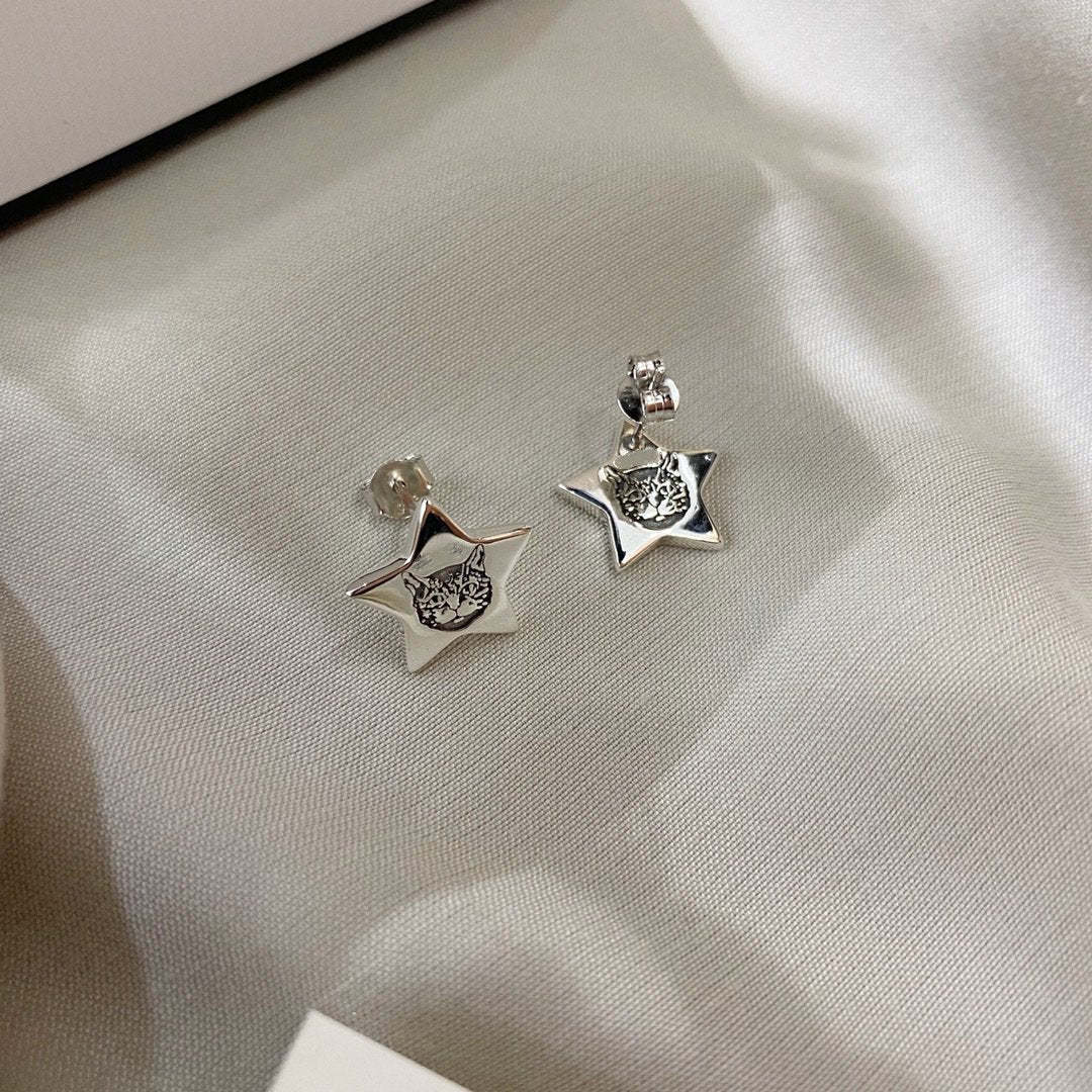 SILVER BLIND FOR LOVE STAR EARRINGS