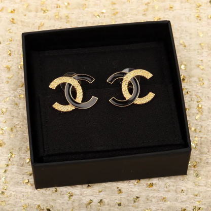 CCE444 CC Black enamel gold embossed stud earrings