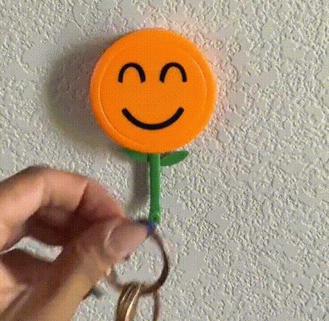 Sunflower Wall Hook – Retractable Self-Adhesive Smiley Flower Hook, No-Drill Decorative Hanger for Home