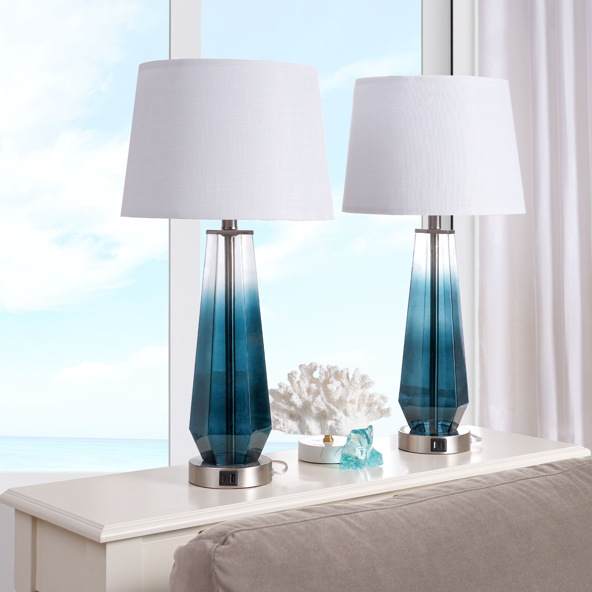 Two metal deals table lamps