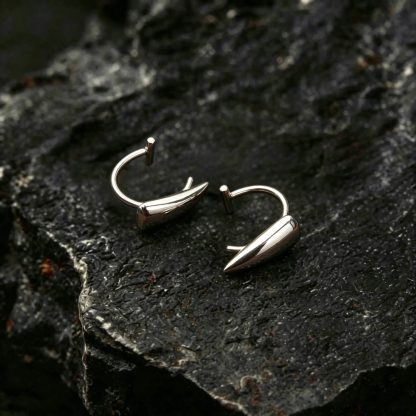 Demonic Fang Nose Piercing