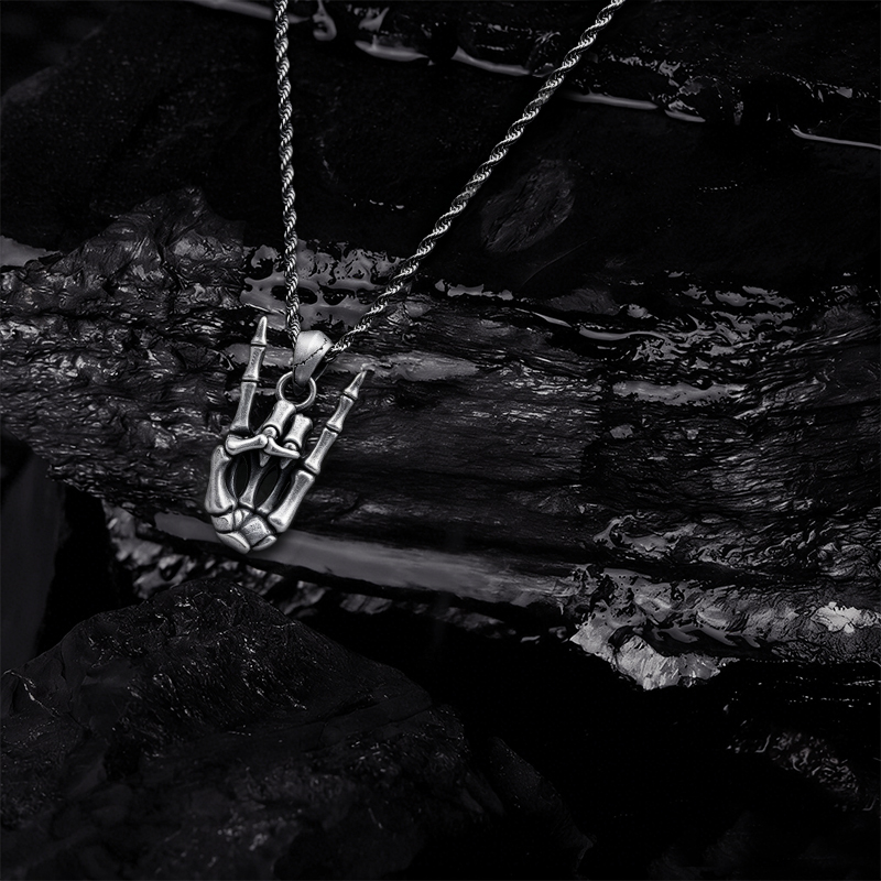 Skeleton Rock Hand Necklace