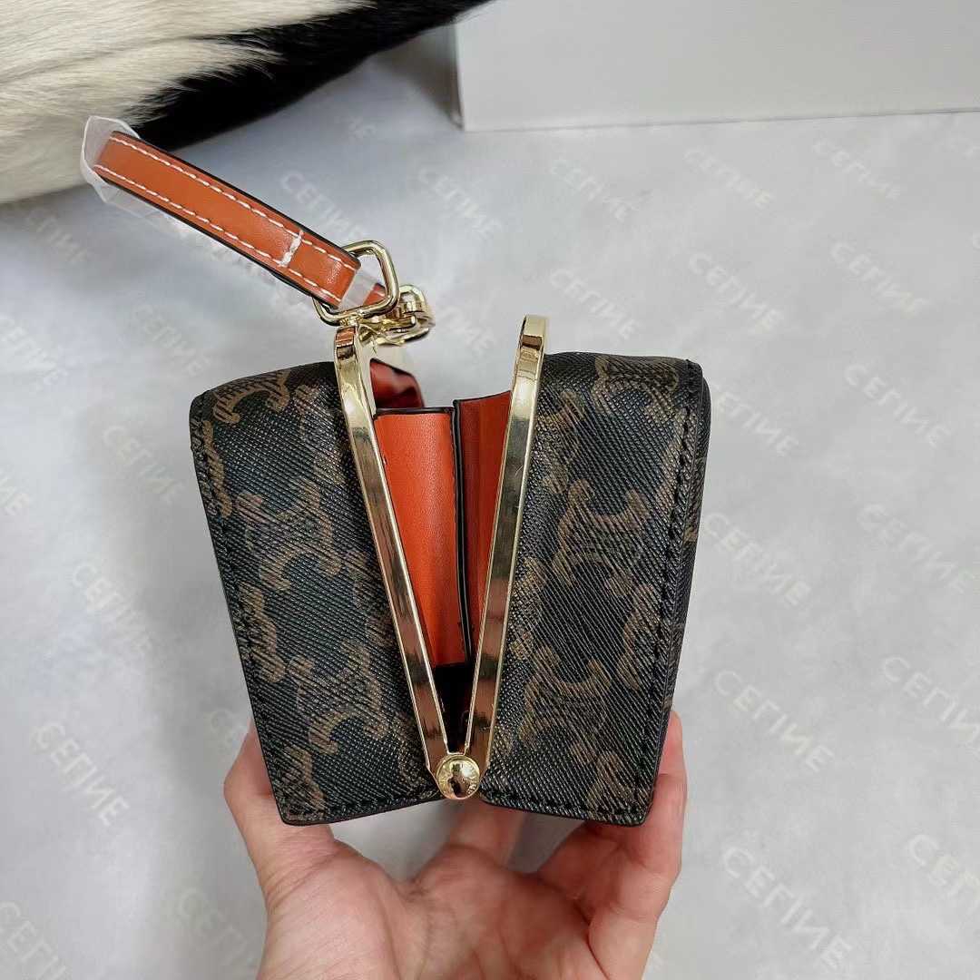 CE MINI VANITY CASE IN TRIOMPHE CANVAS AND CALFSKIN TAN 10J762CZ104LU