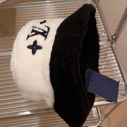 LV SHEEPSKIN BUCKET HAT WHITE AND BLACK