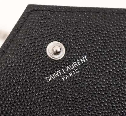SAINT LAURENT CASSANDRE MATELASSE CHAIN WALLET IN GRAIN DE POUDRE EMBOSSED BLACK SILVER 22CM