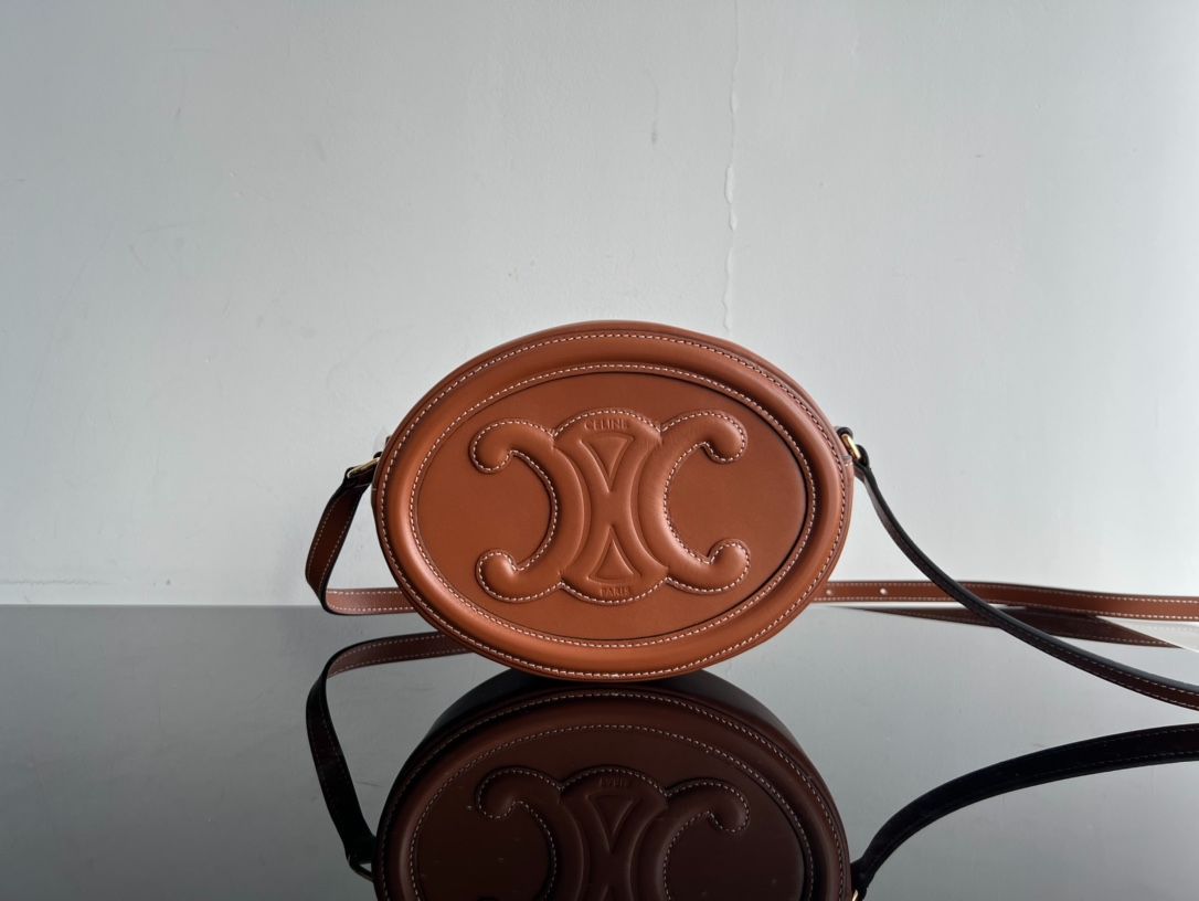 CE CROSSBODY OVAL PURSE CUIR TRIOMPHE IN SMOOTH CALFSKIN TAN 10I703DPQ04LU