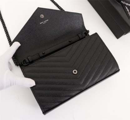 SAINT LAURENT CASSANDRE MATELASSE CHAIN WALLET IN GRAIN DE POUDRE EMBOSSED BLACK NOIR 22CM