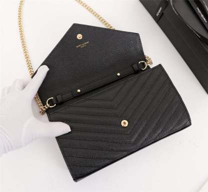 SAINT LAURENT CASSANDRE MATELASSE CHAIN WALLET IN GRAIN DE POUDRE EMBOSSED BLACK GOLD 22CM