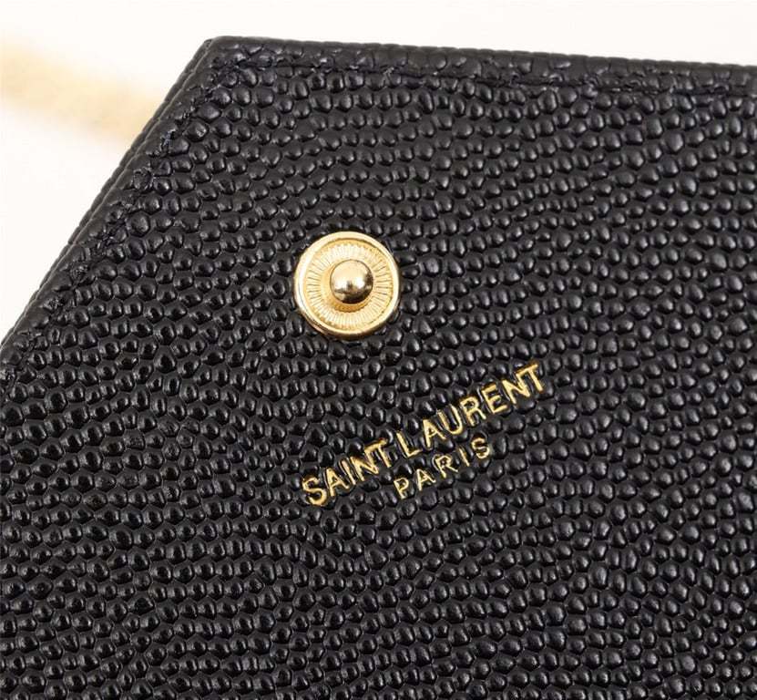 SAINT LAURENT CASSANDRE MATELASSE CHAIN WALLET IN GRAIN DE POUDRE EMBOSSED BLACK GOLD 22CM