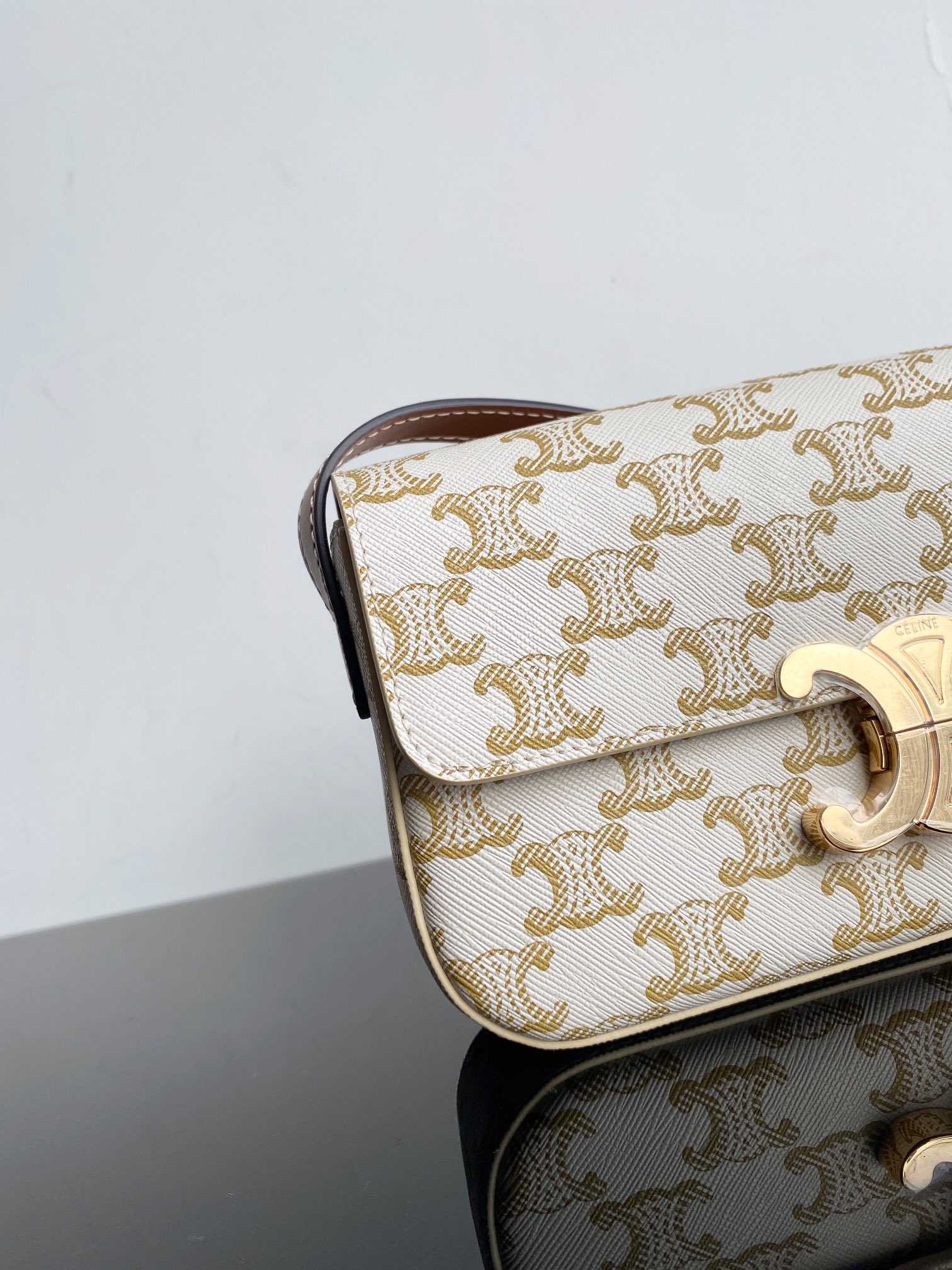 CE TRIOMPHE SHOULDER BAG IN SHINY CALFSKIN GOLD CC WHITE 194142CUZ01BC