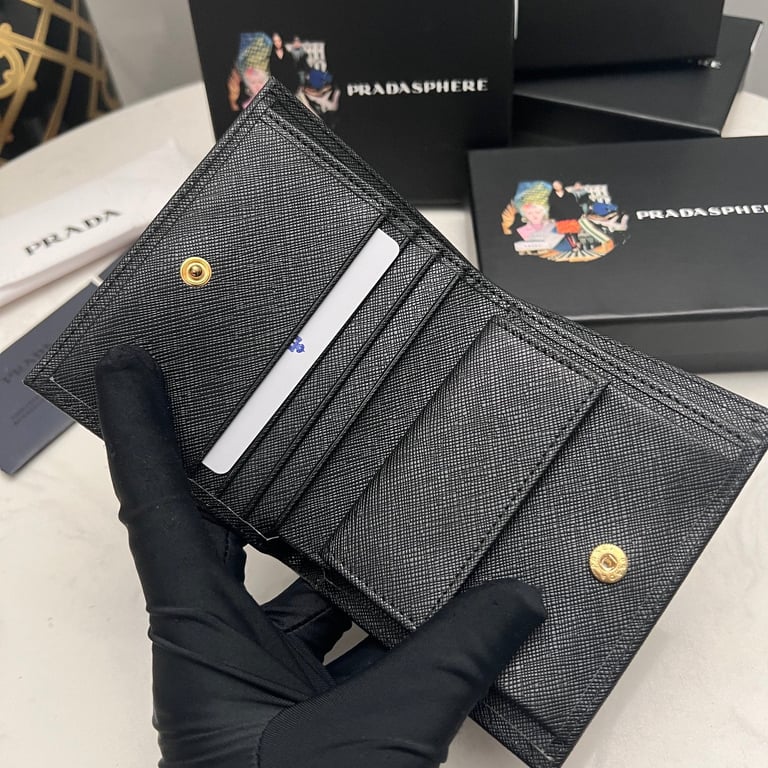 PR SMALL SAFFIANO LUX LEATHER FLAP CONTINENTAL TRIANGLE BLACK WALLET 10CM