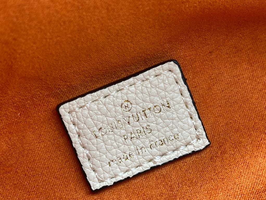 LUV MONOGRAM EMPREINTE CREME BUMBAG M44836