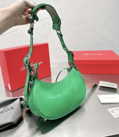 BALENCIAGA LE CAGOLE XS SHOULDER BAG IN GREEN 25CM