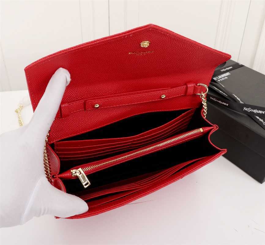 YSL CASSANDRE MATELASSÉ ENVELOPE CHAIN WALLET IN GRAIN DE POUDRE EMBOSSED LEATHER OPYUM RED 695108BOW016008