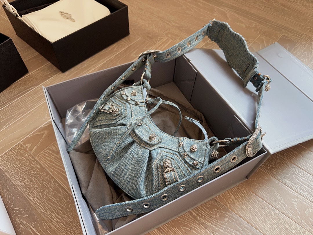 BALENCIAGA LE CAGOLE XS SHOULDER BAG DENIM WITH RHINESTONES IN LIGHT BLUE 25CM 6713092AABV4651