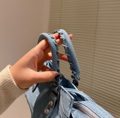 BALENCIAGA WOMENS NEO CAGOLE CITY HANDBAG IN DENIM IN BLUE 26CM