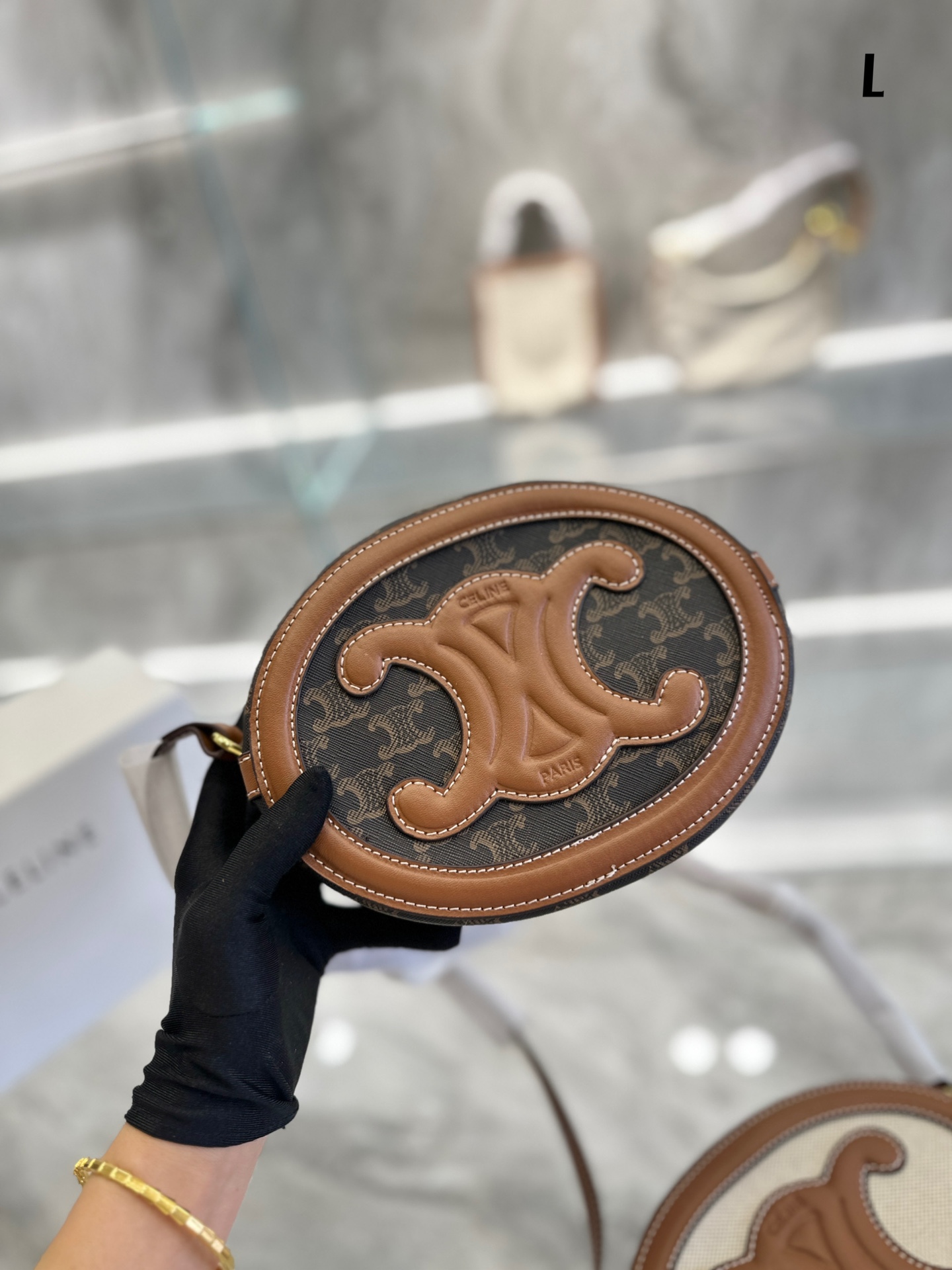 CE OVAL BAG CUIR TRIOMPHE IN TRIOMPHE CANVAS AND CALFSKIN TAN 20CM 198602EIN04LU