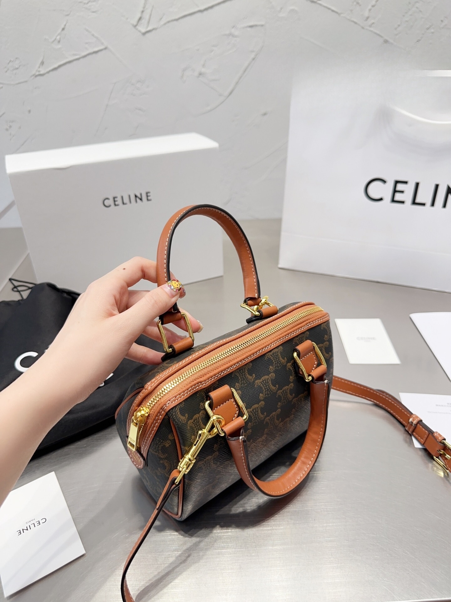 CE SMALL BOSTON IN TRIOMPHE CANVAS AND CALFSKIN TAN 19CM 113772CAS04LU