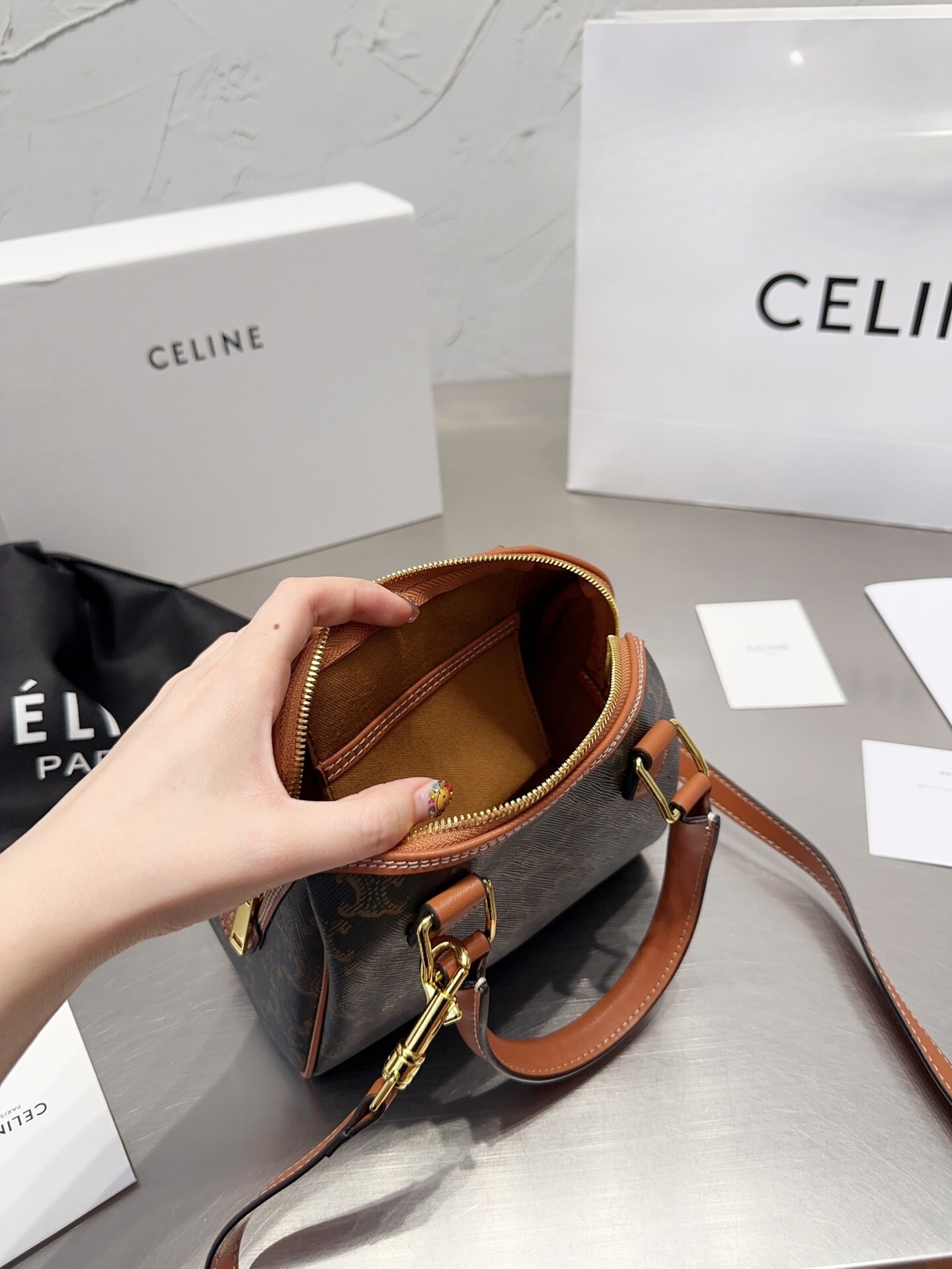 CE SMALL BOSTON IN TRIOMPHE CANVAS AND CALFSKIN TAN 19CM 113772CAS04LU