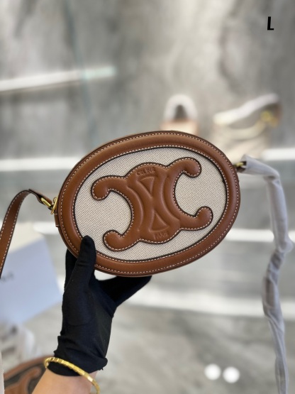 CE OVAL BAG CUIR TRIOMPHE IN TEXTILE AND CALFSKIN NATURAL 20CM 198602EFL02NT