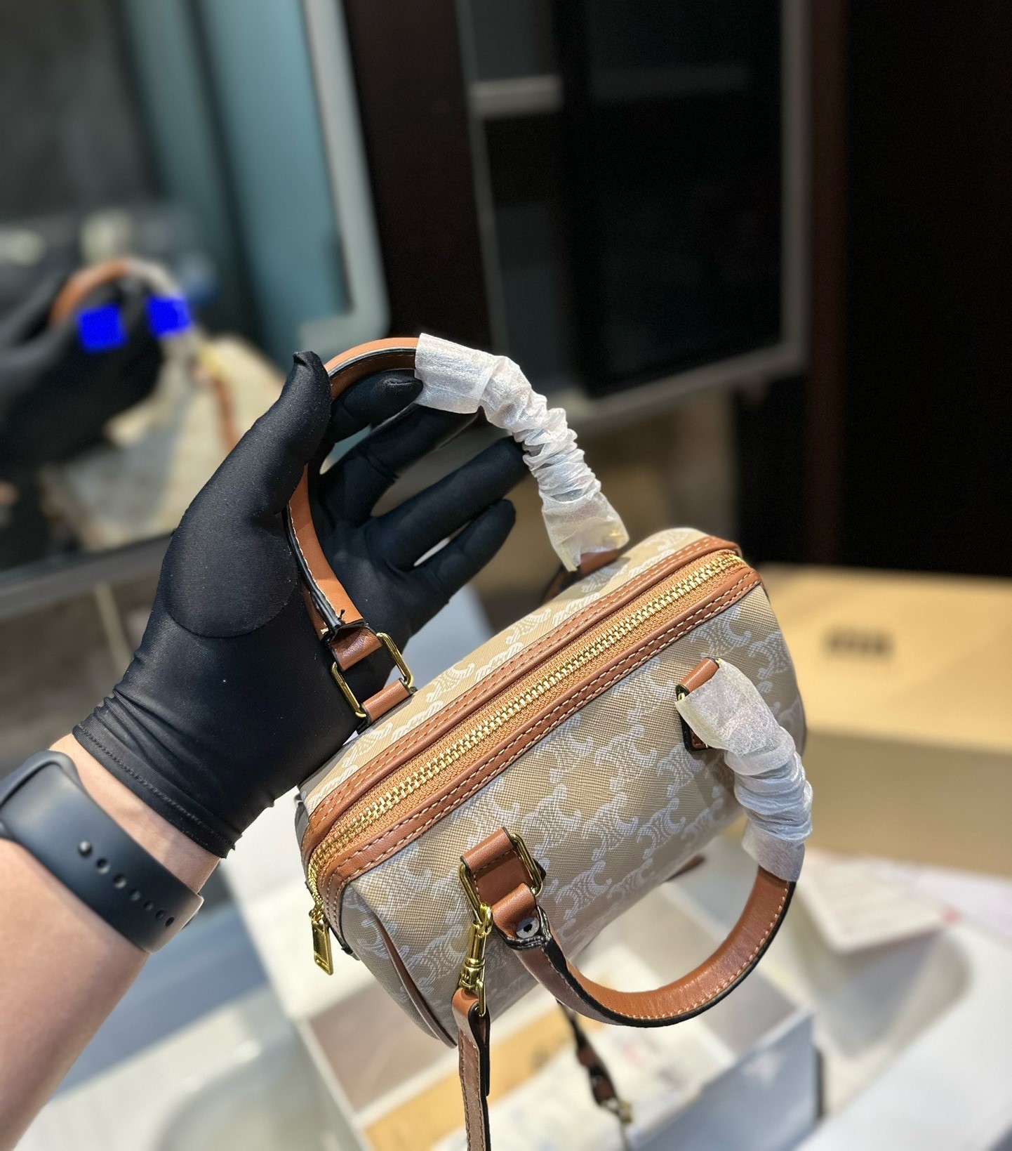 CE SMALL BOSTON CUIR TRIOMPHE IN TRIOMPHE CANVAS AND CALFSKIN GREGE 19CM  113772FLC 02GR