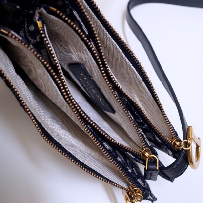 DOR SADDLE TRIPLE ZIP CROSSBODY POUCH OBLIQUE CANVAS 19CM