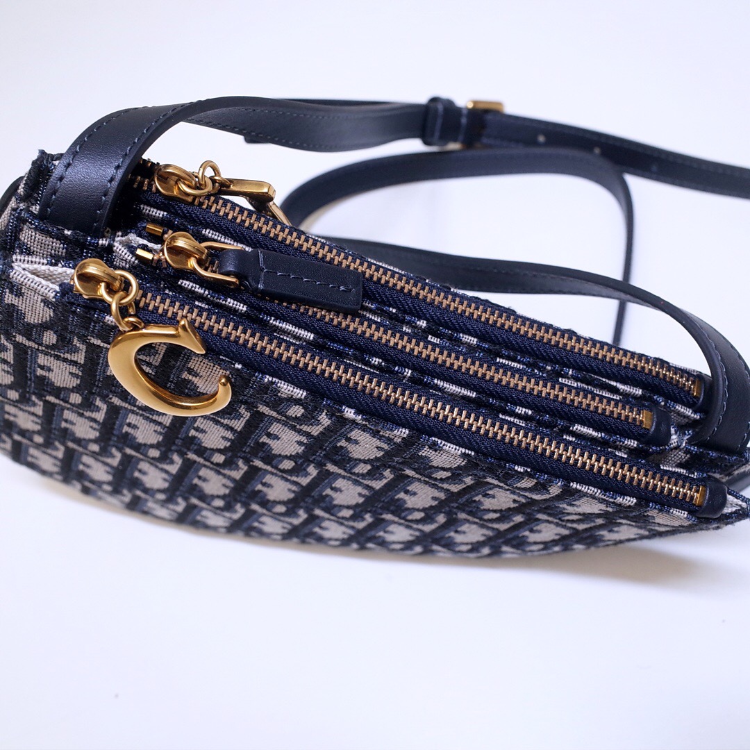 DOR SADDLE TRIPLE ZIP CROSSBODY POUCH OBLIQUE CANVAS 19CM