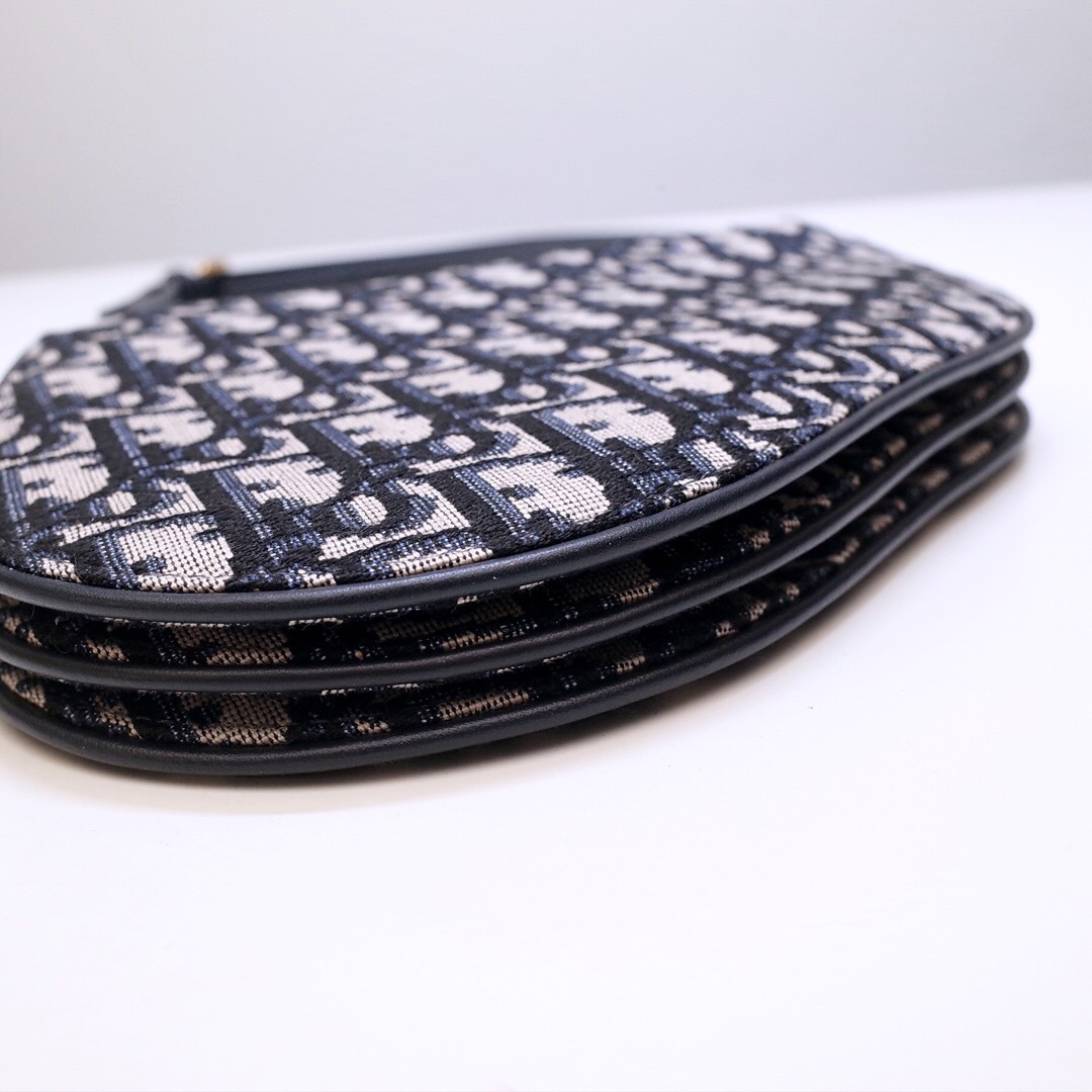 DOR SADDLE TRIPLE ZIP CROSSBODY POUCH OBLIQUE CANVAS 19CM