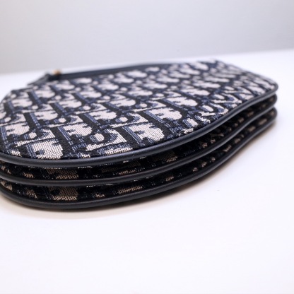 DOR SADDLE TRIPLE ZIP CROSSBODY POUCH OBLIQUE CANVAS 19CM