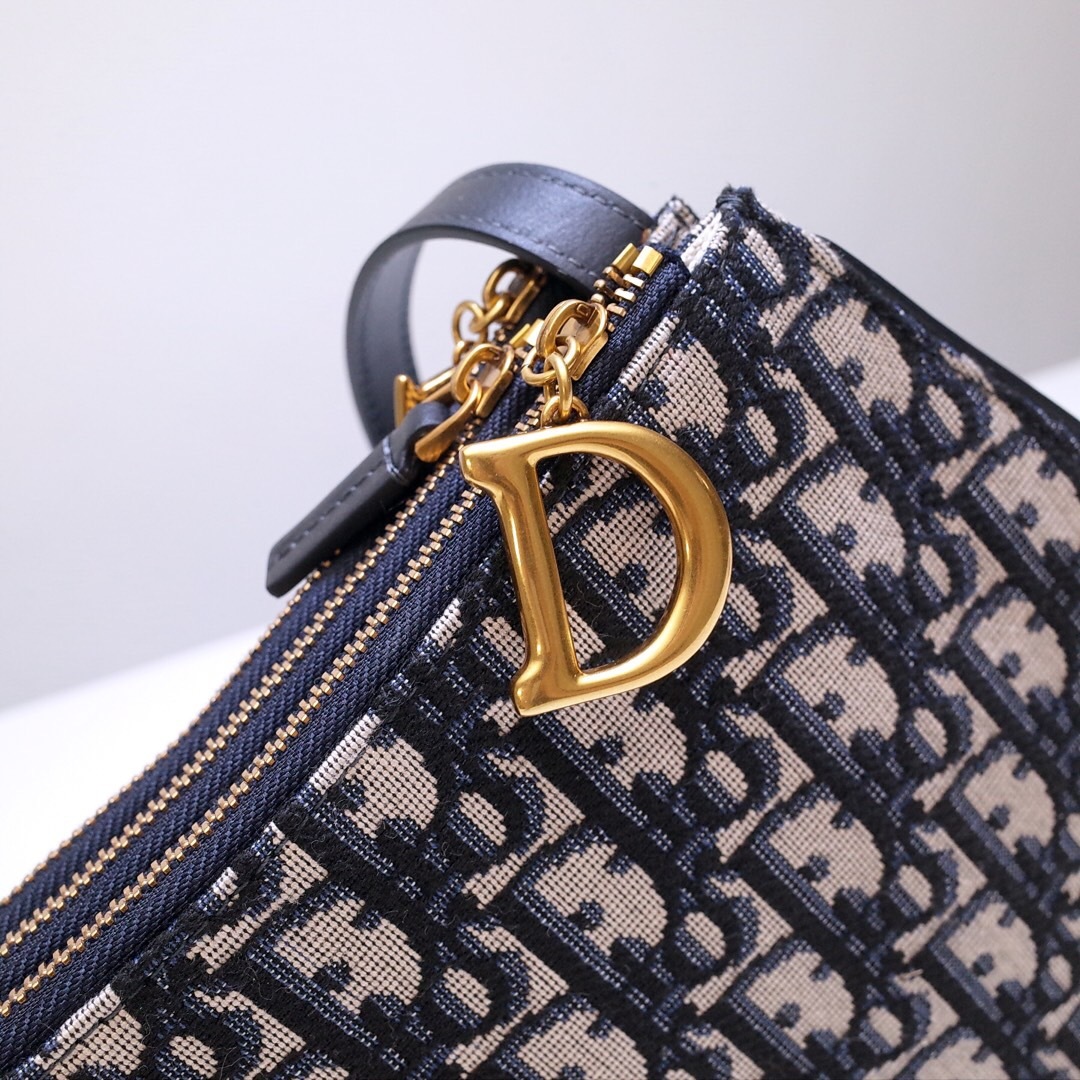 DOR SADDLE TRIPLE ZIP CROSSBODY POUCH OBLIQUE CANVAS 19CM