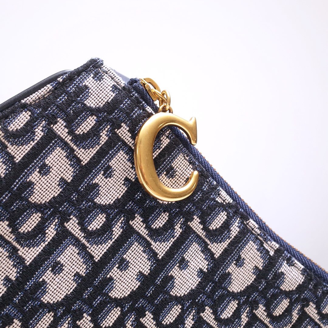 DOR SADDLE TRIPLE ZIP CROSSBODY POUCH OBLIQUE CANVAS 19CM