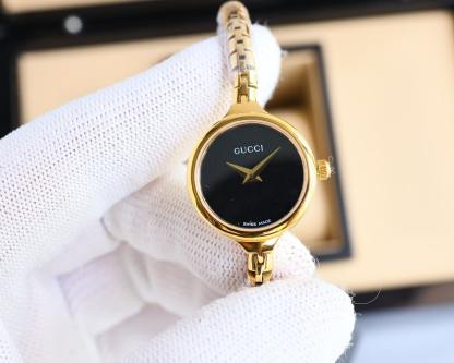 GUCCI LADIES WATCH ROUND CASE WITH SLIM DIAL GOLD IN BLACK 22MM